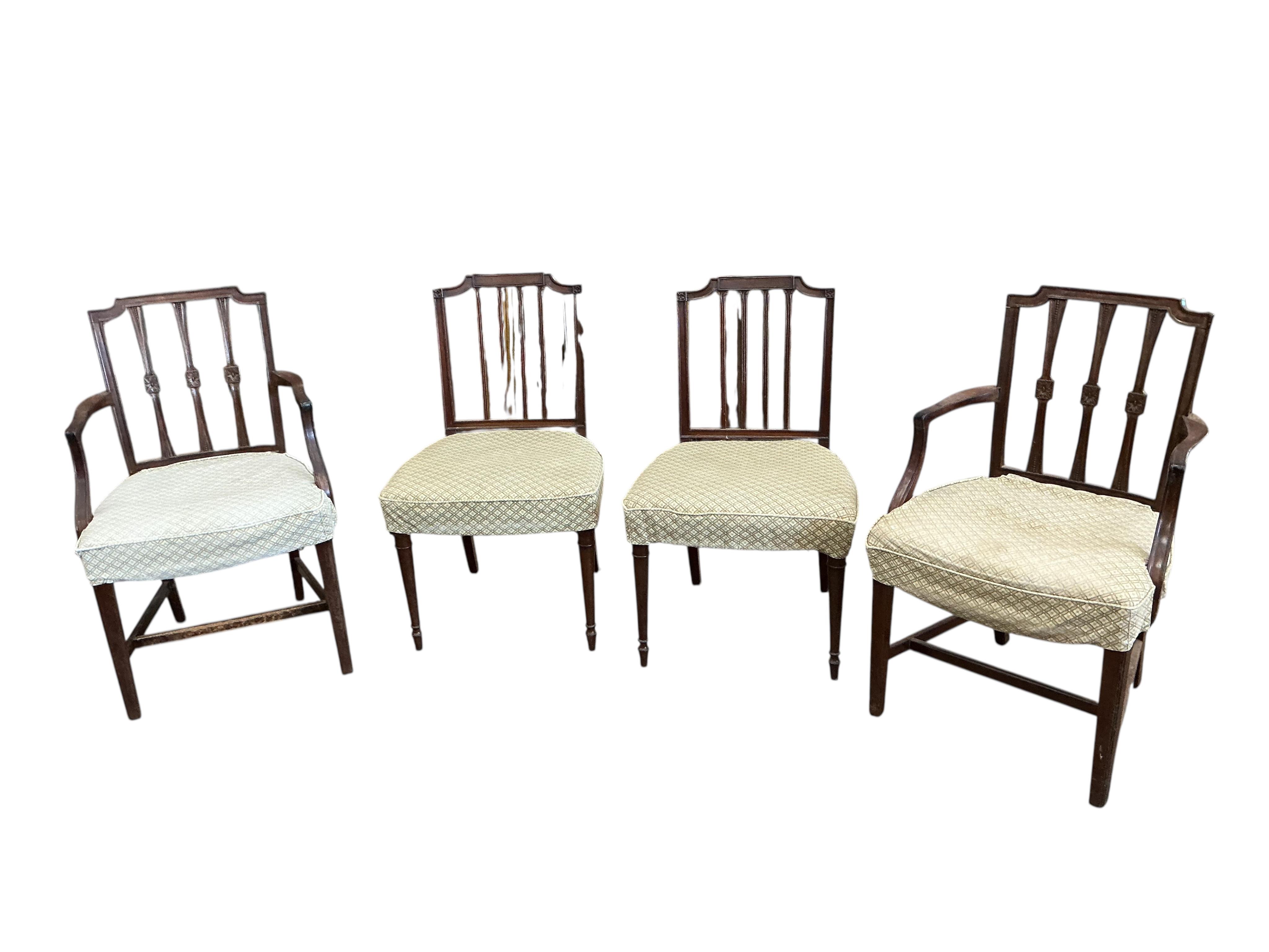 A harlequin set of eight George III Sheraton style mahogany dining chairs, two with arms